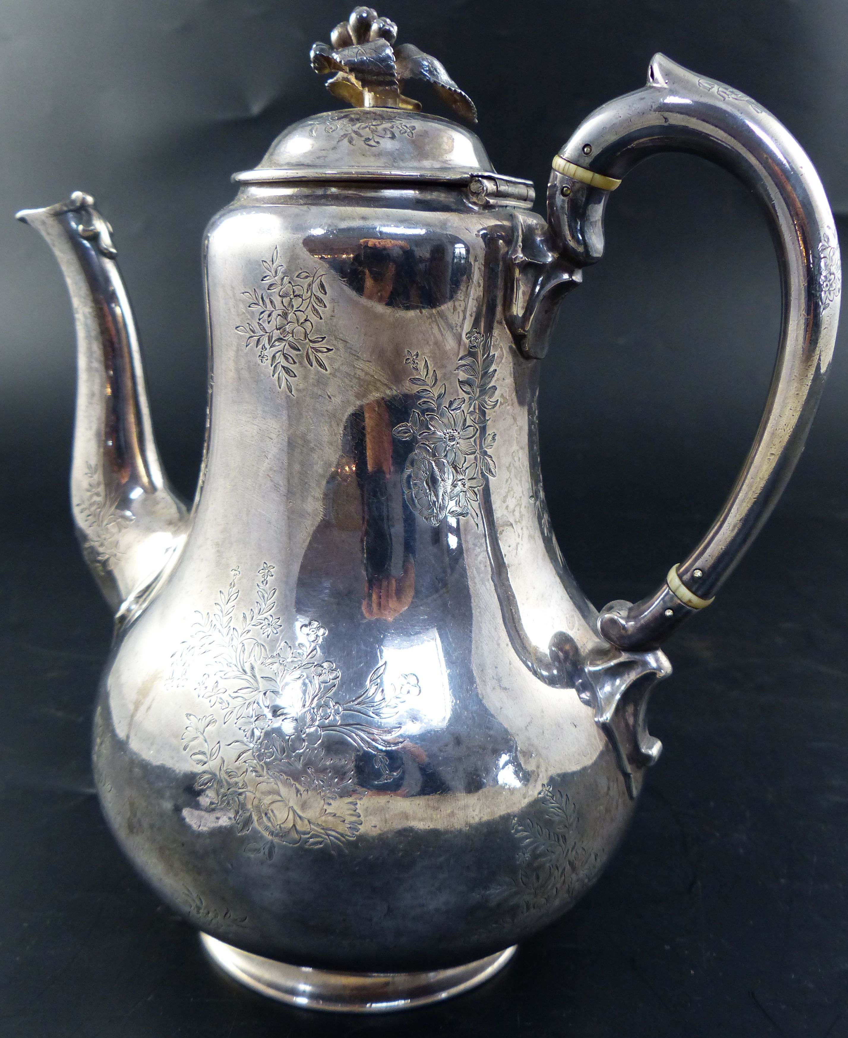 A Victorian silver baluster coffee pot, height 22.9cm, gross 25.5oz.